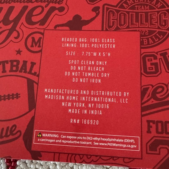 Red &white Handmade Beaded Football Clutch w/ Tassel
Zipper closure.Lined inside - Picture 3 of 7